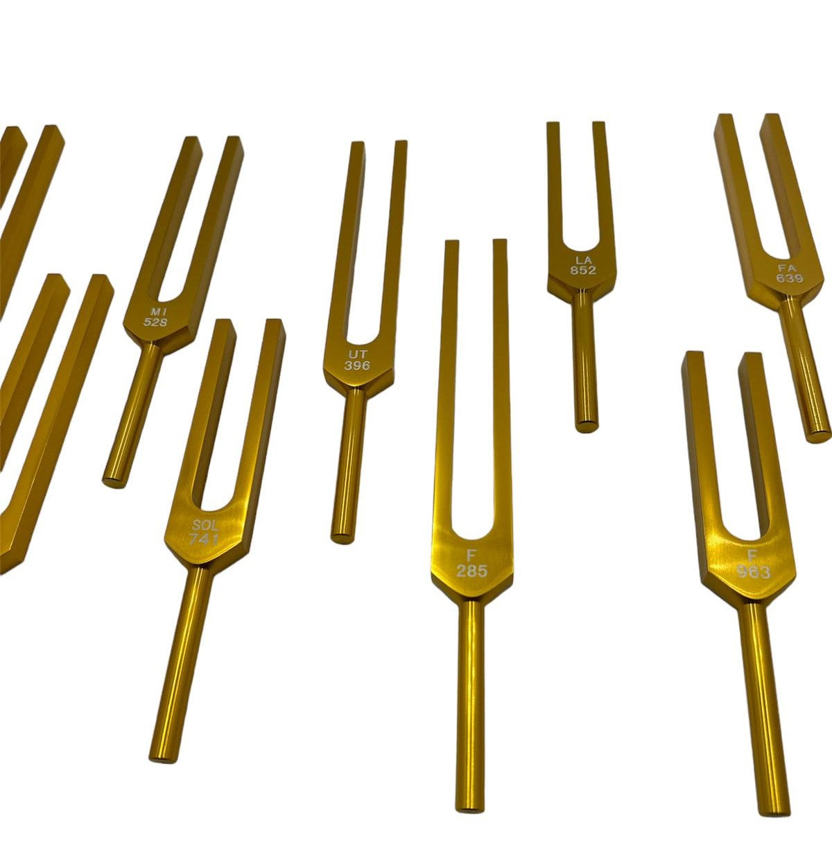 Harmony Haven: 9-Piece Secret Solfeggio Gold Tuning Fork Set with Heart Om and Removable Buddha Bead Striker - Includes Bag - Thecosmicaccess