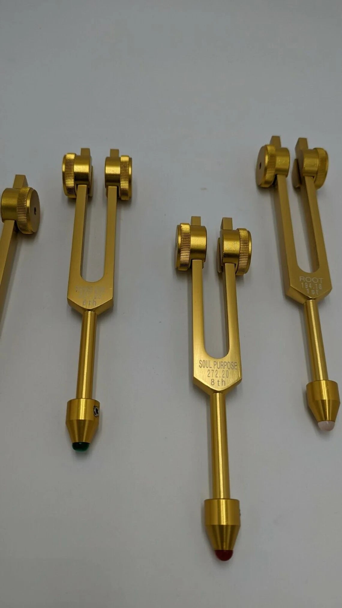 Gold Color Chakra Weighted Set of 8 with Gem Feet, Velvet Bag and Striker - Thecosmicaccess