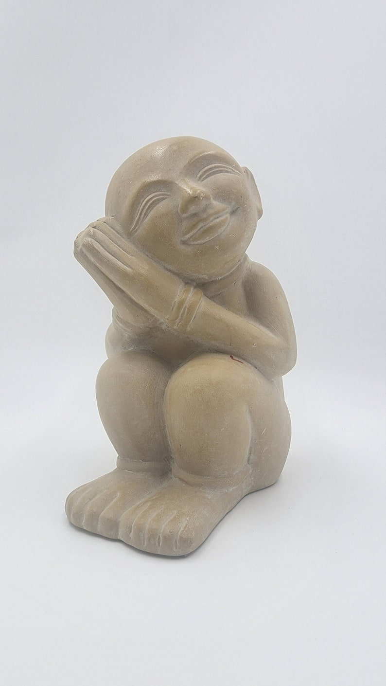 Timeless Charm: Captivating Antique Soapstone Statue of a Dreaming Child - Thecosmicaccess