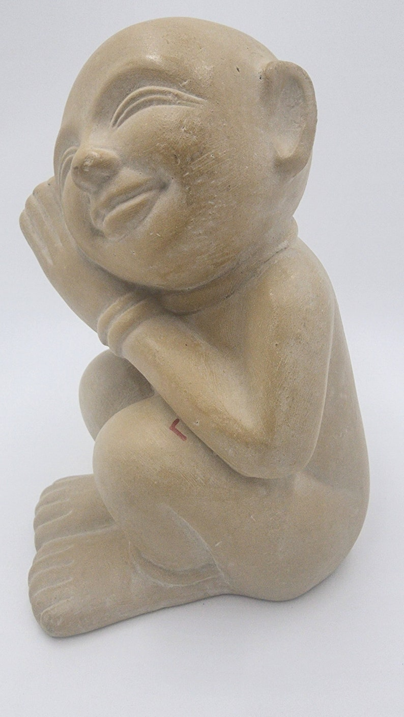 Timeless Charm: Captivating Antique Soapstone Statue of a Dreaming Child - Thecosmicaccess
