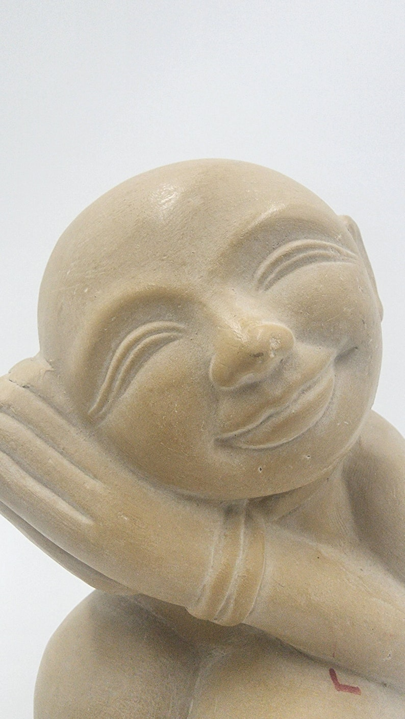 Timeless Charm: Captivating Antique Soapstone Statue of a Dreaming Child - Thecosmicaccess