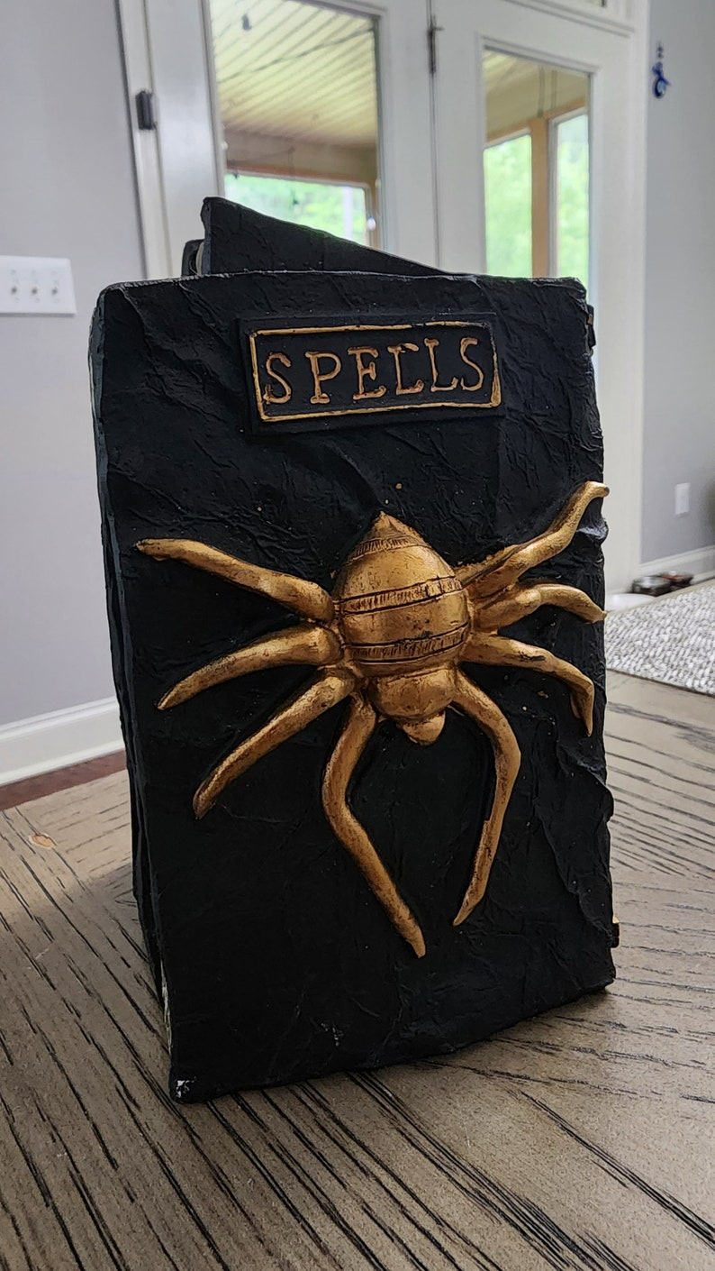 Enchanting Spellbook Tabletop Halloween Decoration - Creepy and Captivating Home Decor Piece - Thecosmicaccess
