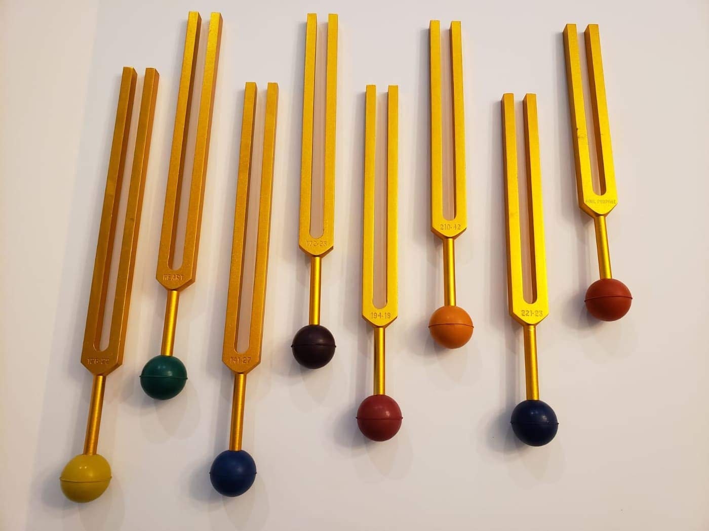 Chakra Tuning Fork Set of 7 Gold Finish with Removable Color Rubber Balls with mallet and Velvet Bag - Thecosmicaccess
