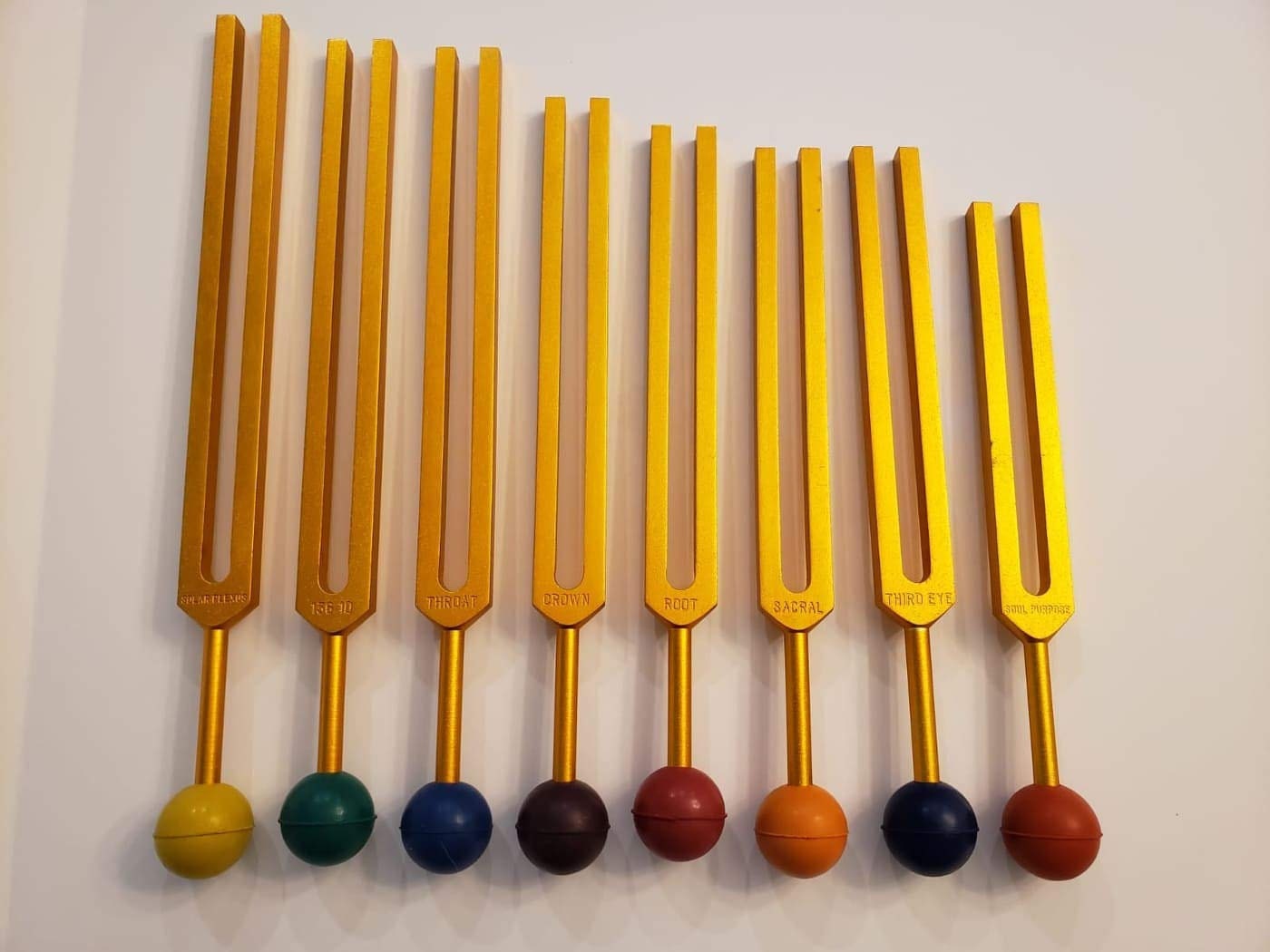 Chakra Tuning Fork Set of 7 Gold Finish with Removable Color Rubber Balls with mallet and Velvet Bag - Thecosmicaccess