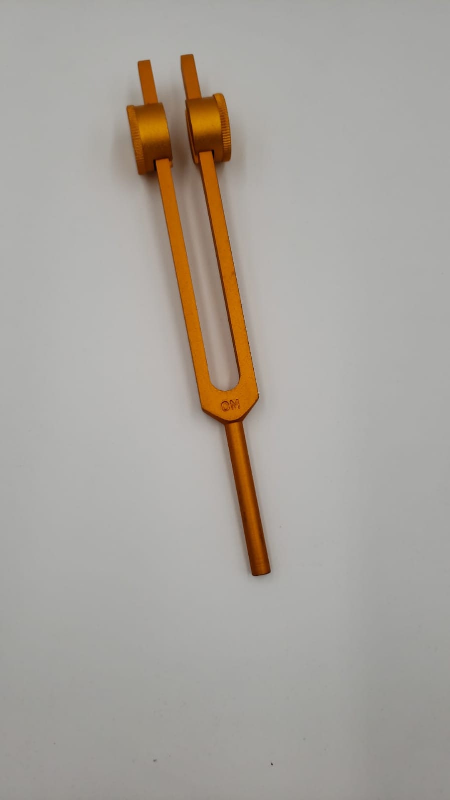 Om 136.1 Gold Finish Tuning fork with Velvet Bag Striker and Color Removable Ball - Thecosmicaccess