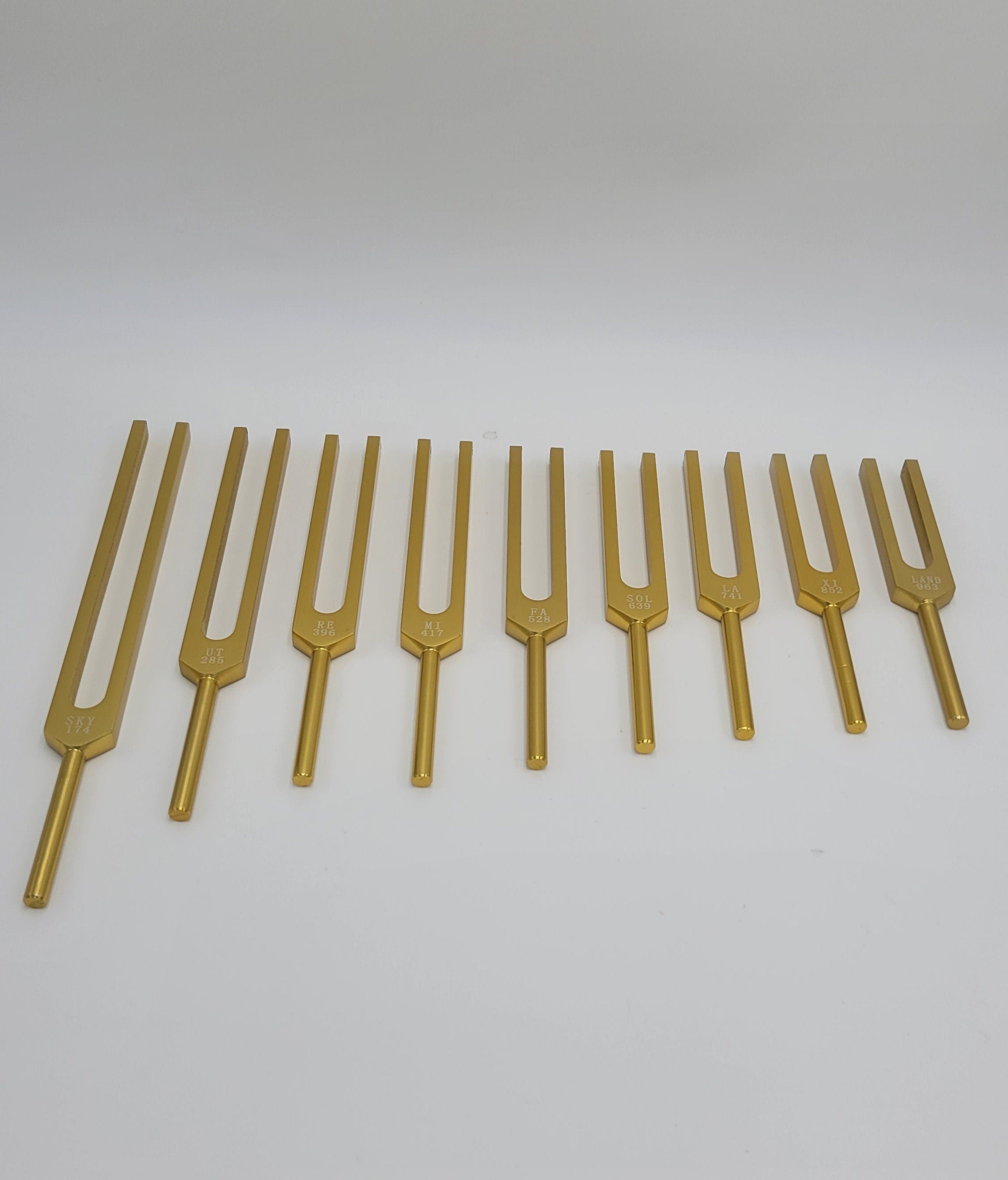 Solfeggio Set of 9 GOLD Color Unweighted Tuning Fork Set with Mallet and Pouch - Thecosmicaccess