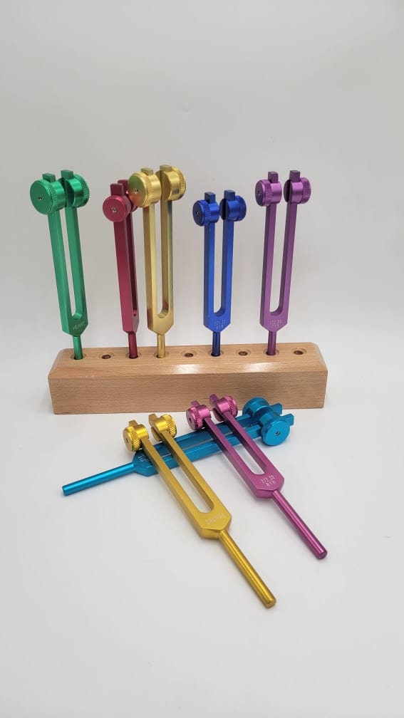 Chakra Set of 8 COLOR WEIGHTED Tuning forks with Solid Wood Tuning Forks Holder a Bag and 4 Strikers - Thecosmicaccess