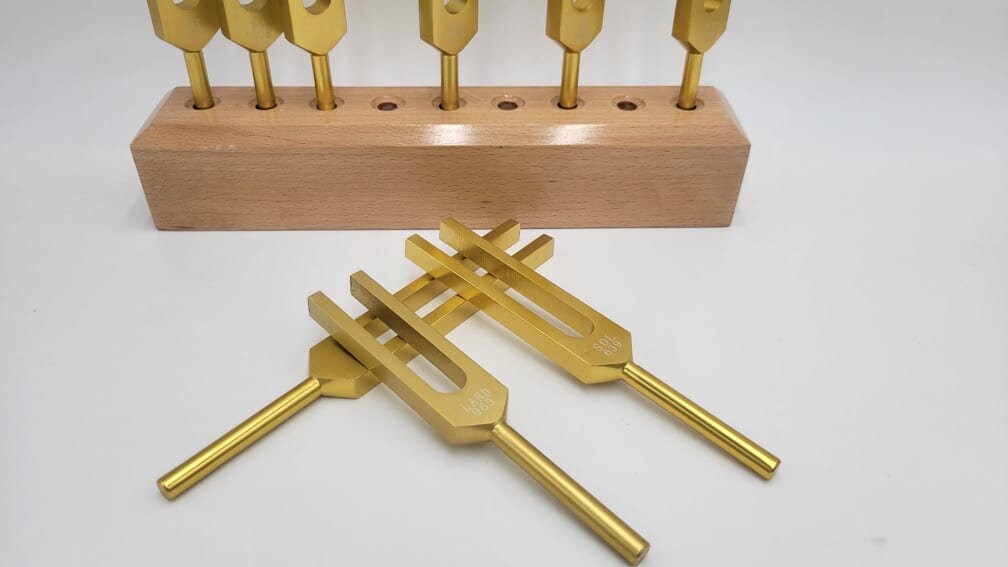 Solfeggio Set of 9 GOLD Color Unweighted Tuning Fork Set with SOLID Wood Tuning Fork Holder a Bag and 4 Strikers - Thecosmicaccess