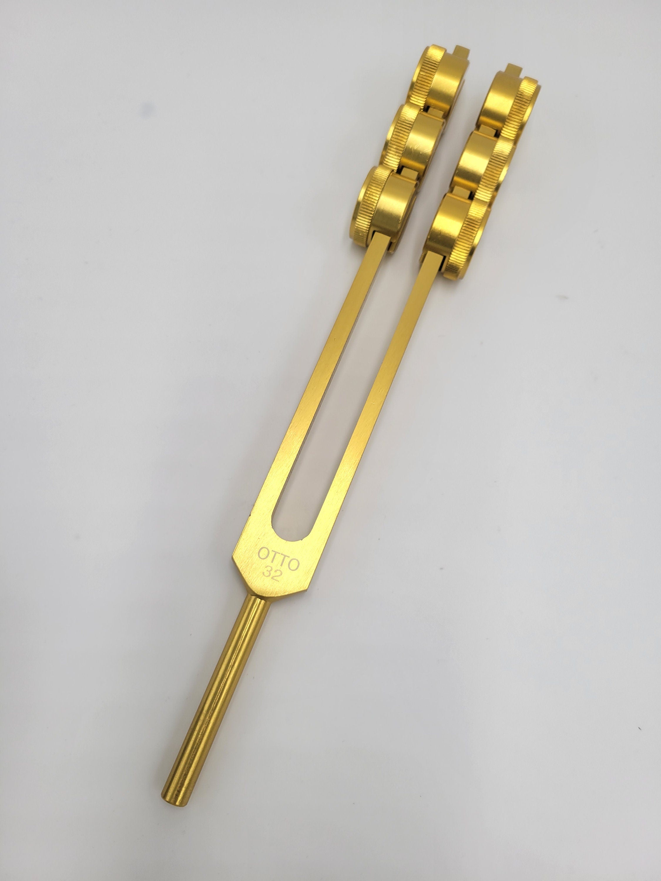 Gold Finish 32Hz Weighted Otto Tuning Fork with Mallet and Bag - Thecosmicaccess