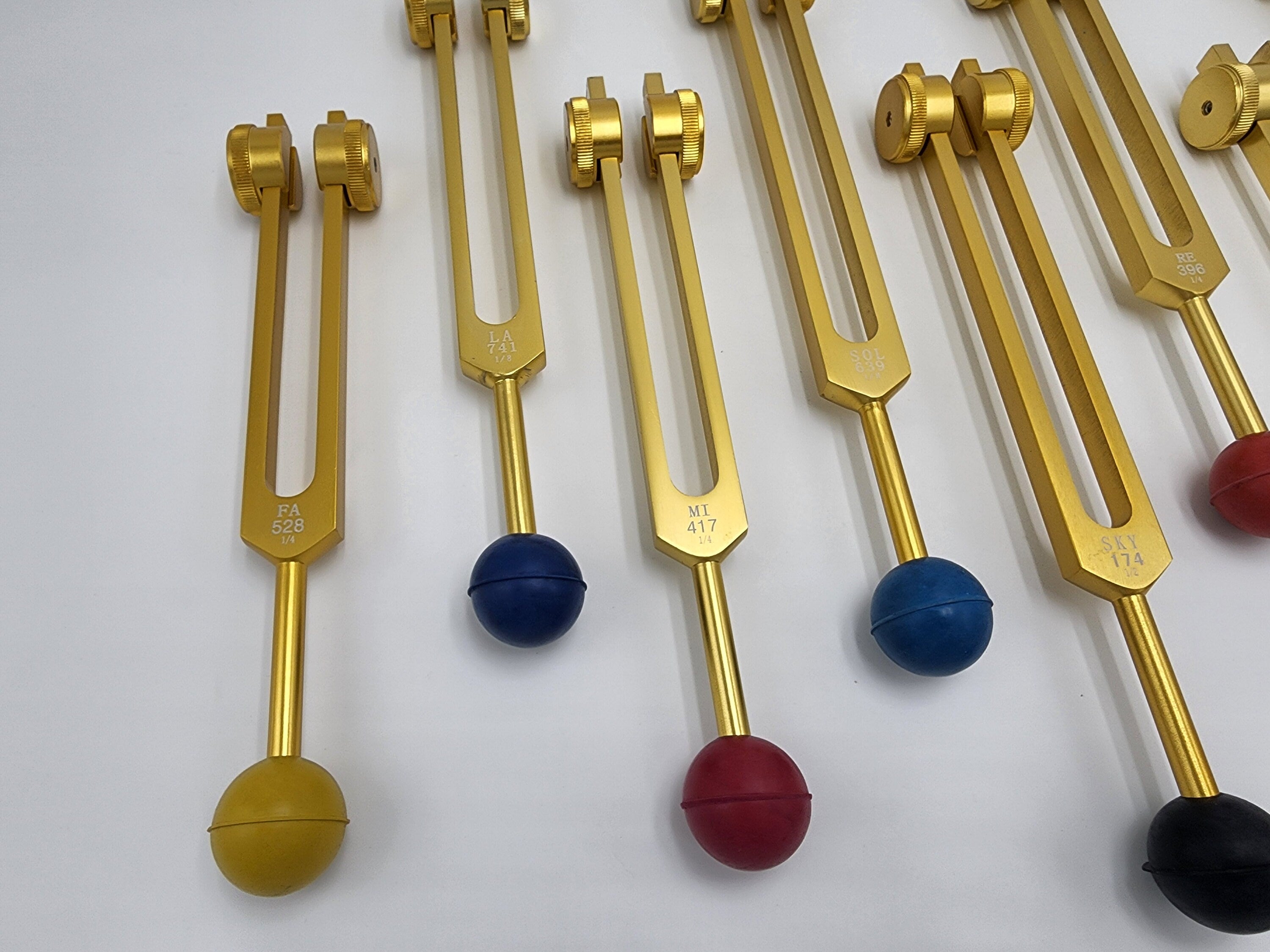 Gold Color DNA Repair Sacred Solfeggio Weighted Tuning Fork Set of 9 with Activator Rubber Balls and Velvet Bag - Thecosmicaccess