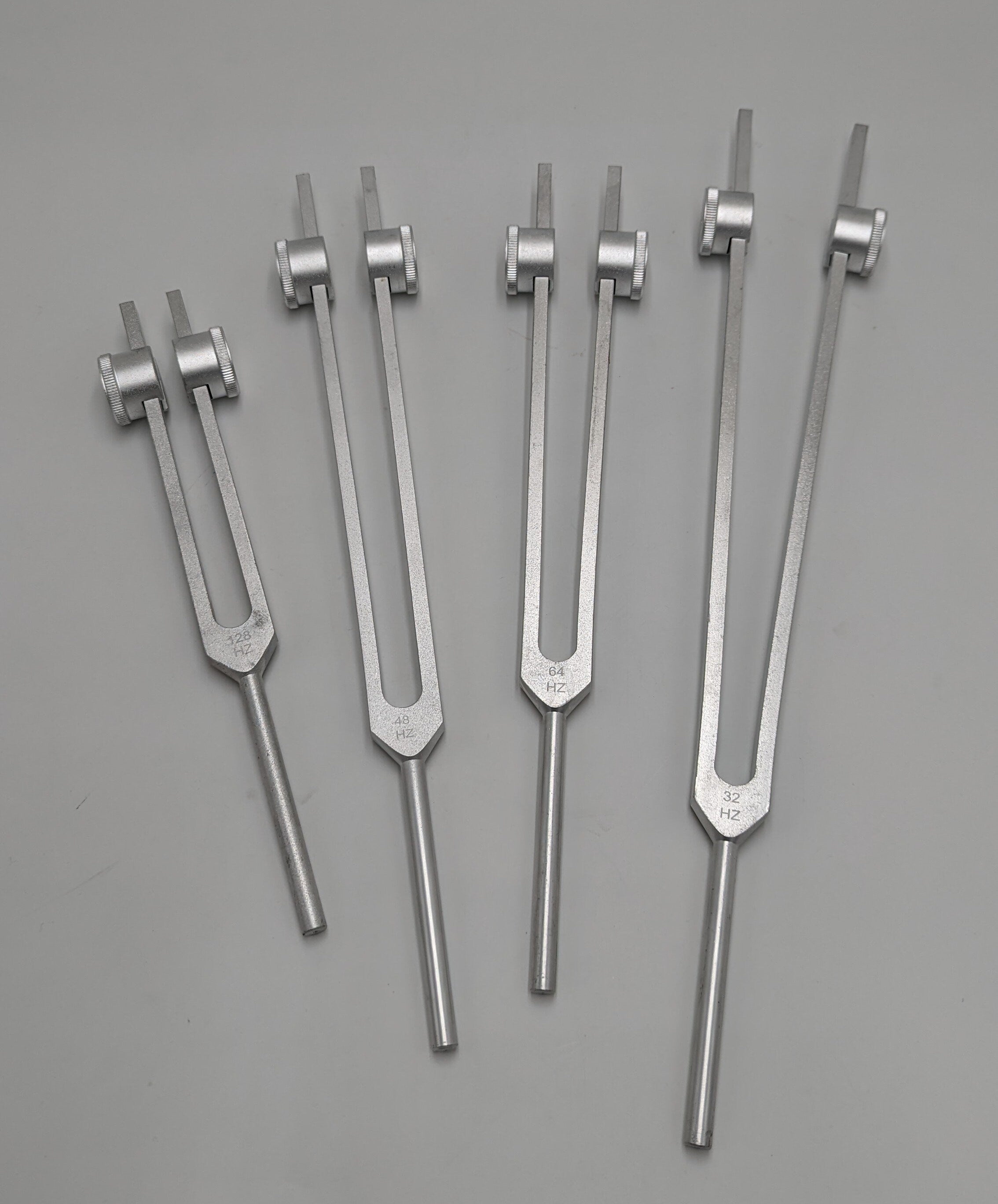 Professional Otto Tuners Weighted 4 Tuning Forks 32 Hz 48 Hz 64 Hz and 128 Hz with Velvet Bag and Striker - Thecosmicaccess