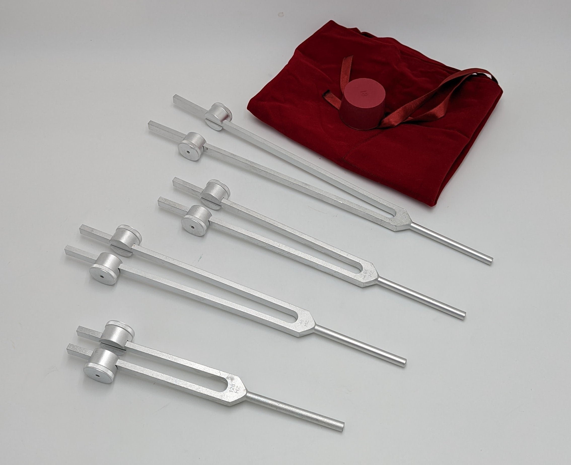 Professional Otto Tuners Weighted 4 Tuning Forks 32 Hz 48 Hz 64 Hz and 128 Hz with Velvet Bag and Striker - Thecosmicaccess