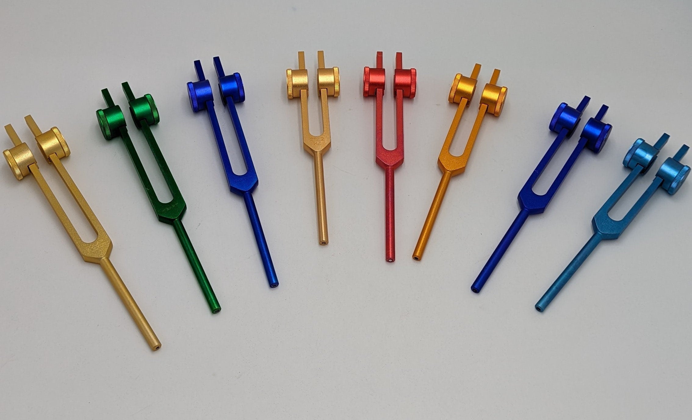 Color Coded Chakra Weighted Tuning Fork Set of 8 for Healing with Mallet, Rubber Activator and Pouch - Thecosmicaccess