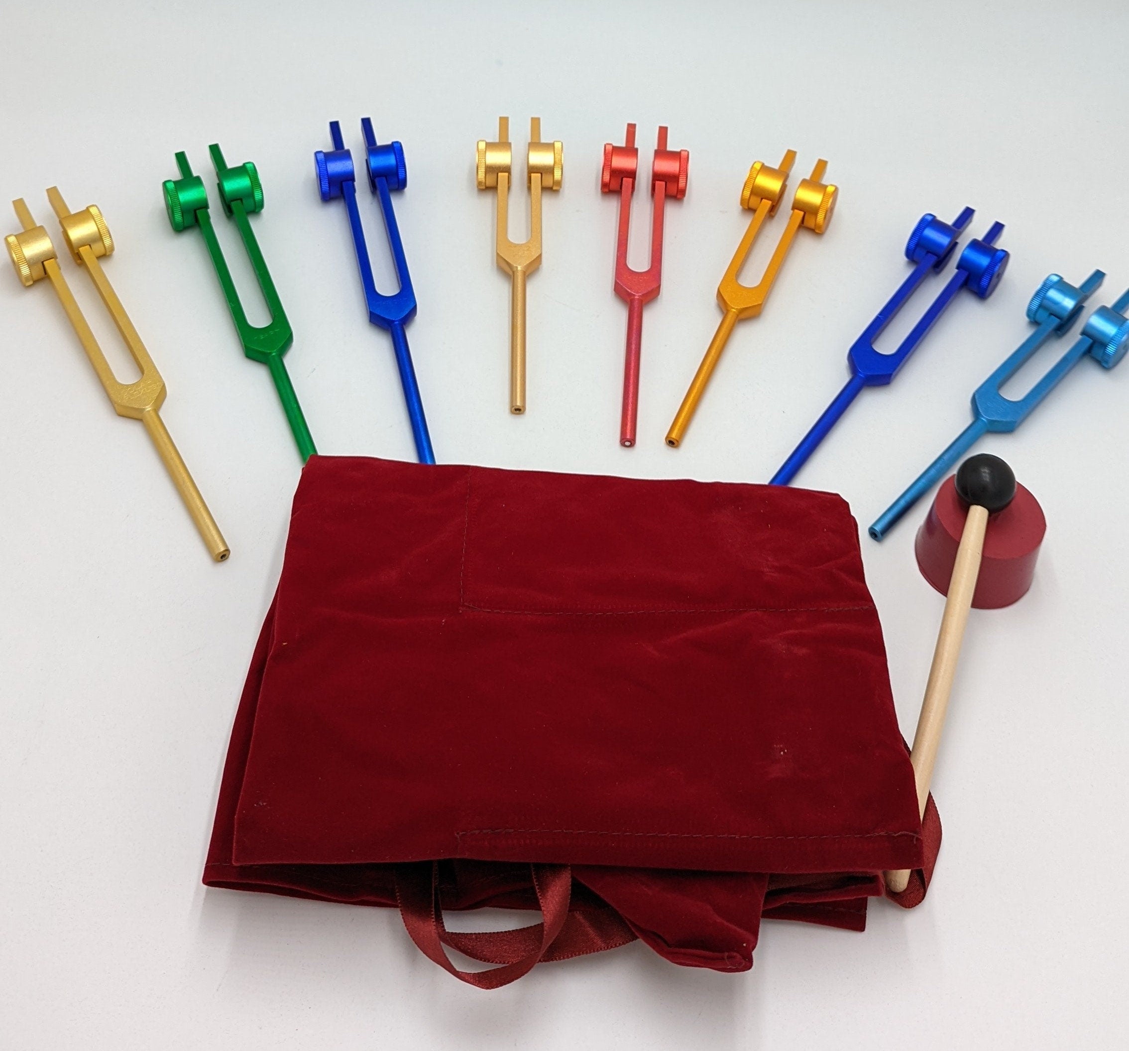 Color Coded Chakra Weighted Tuning Fork Set of 8 for Healing with Mallet, Rubber Activator and Pouch - Thecosmicaccess
