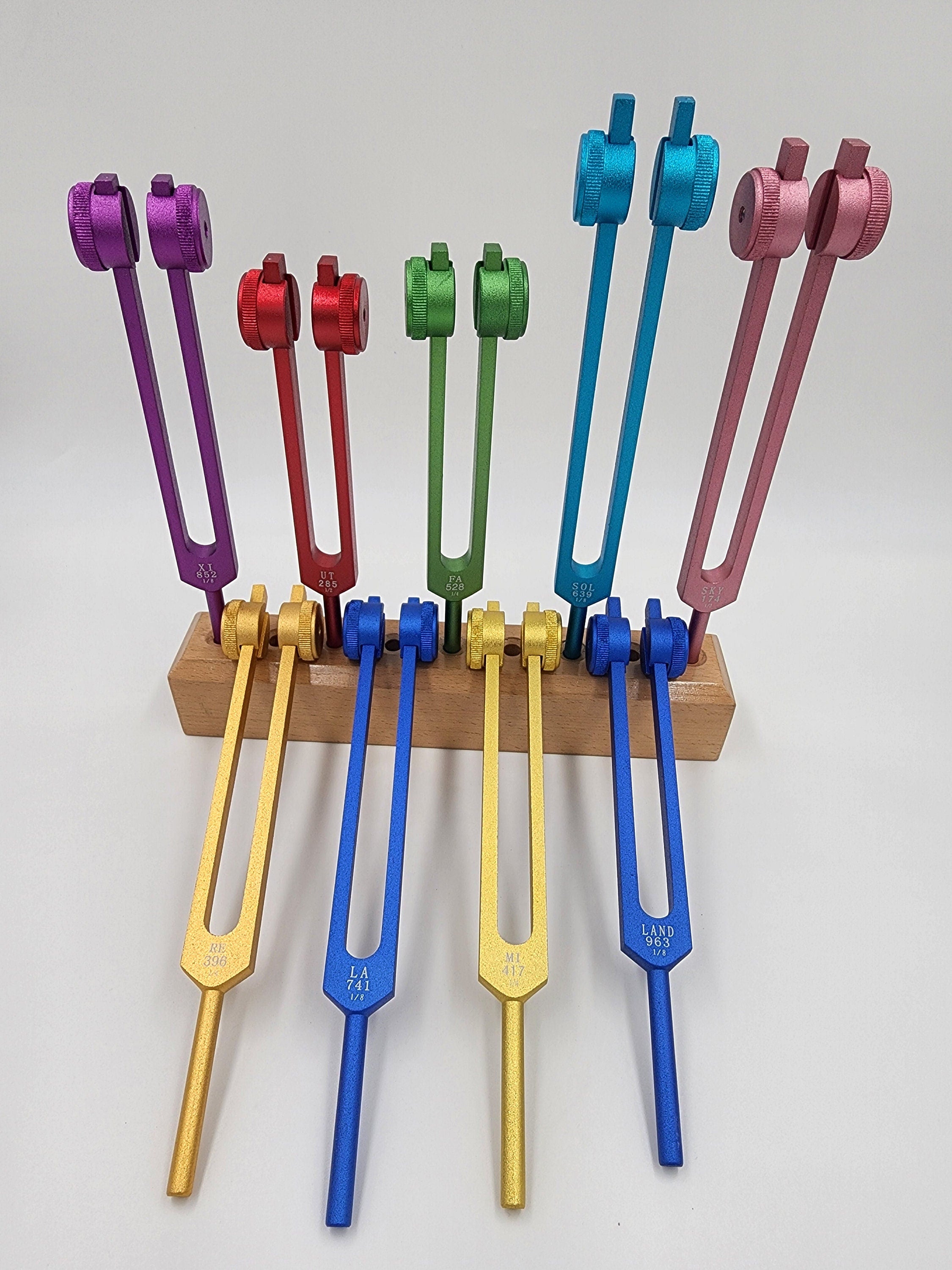 Weighted 9 Set Solfeggio Frequencies Tuning Forks For Healing Tuned .25 Hz for Sound Healing with WOODEN STAND BASE Strikers and Bags - Thecosmicaccess
