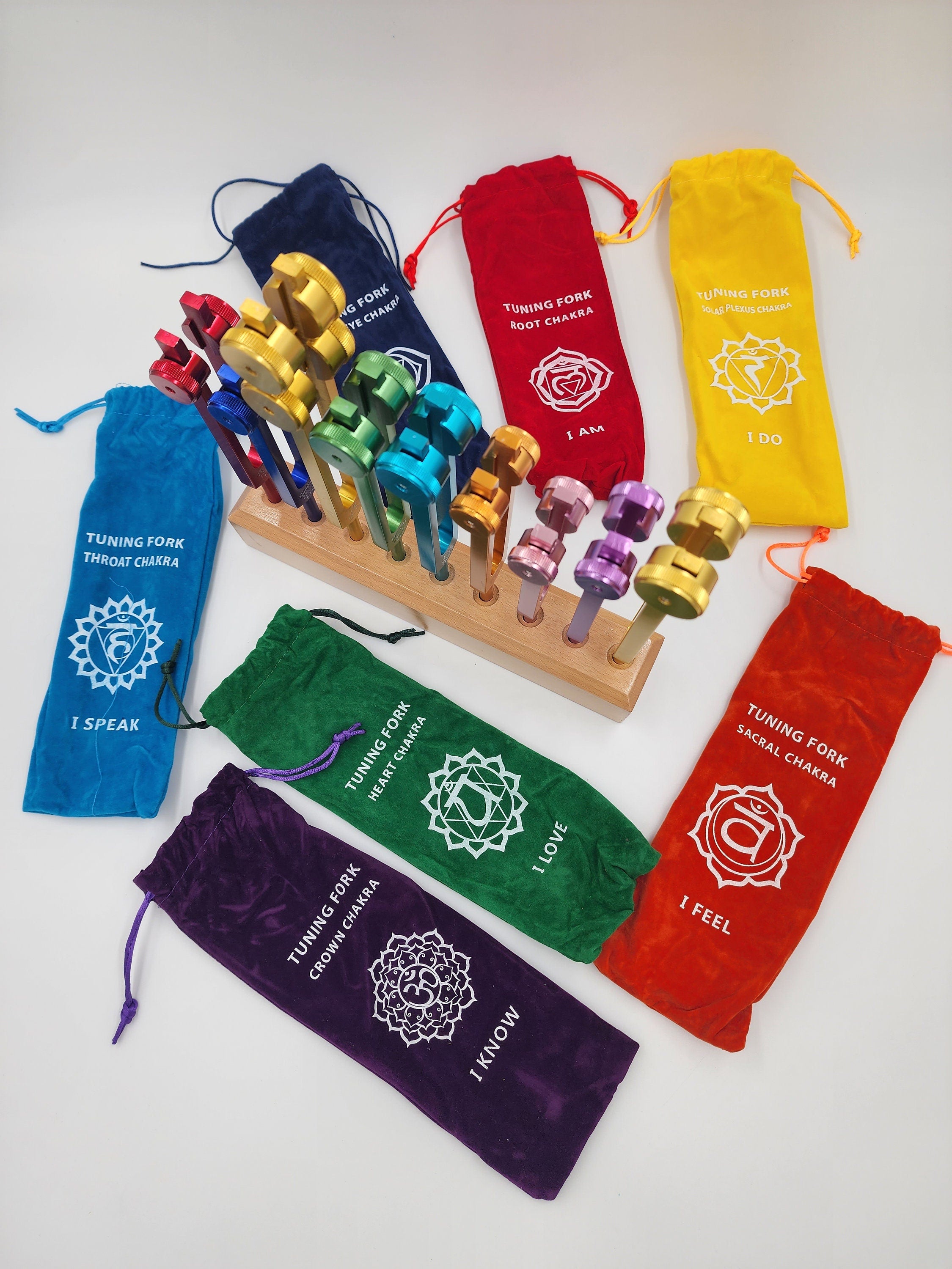 Color Weighted Chakra Tuning Fork Set of 9/8 with Heavy Duty Wooden Display Stand 8 Strikers and Individual Color Coded Sign Bags - Thecosmicaccess