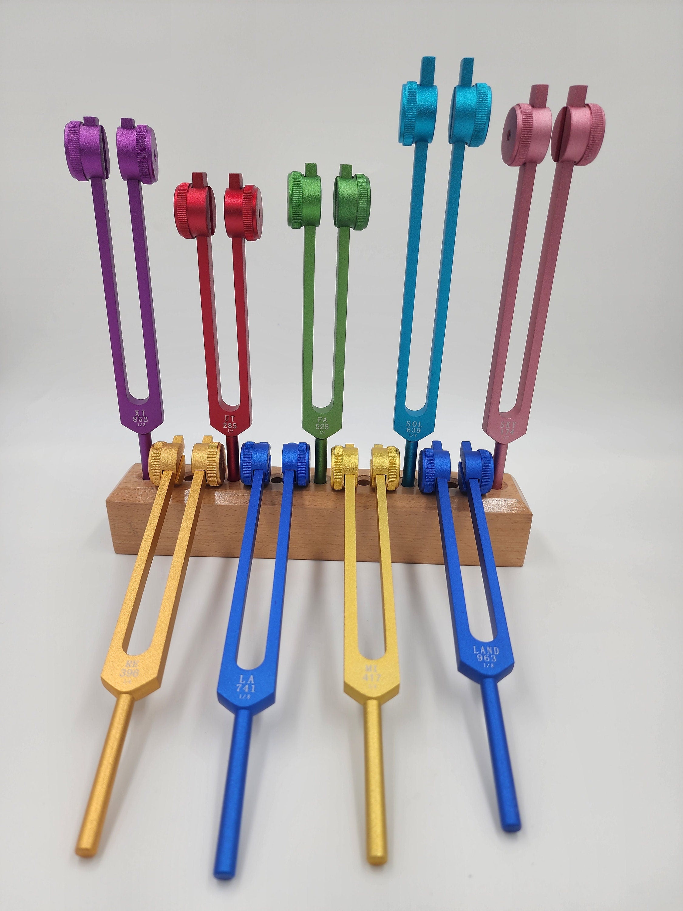 Weighted 9 Set Solfeggio Frequencies Tuning Forks For Healing Tuned .25 Hz for Sound Healing with WOODEN STAND BASE Strikers and Bags - Thecosmicaccess