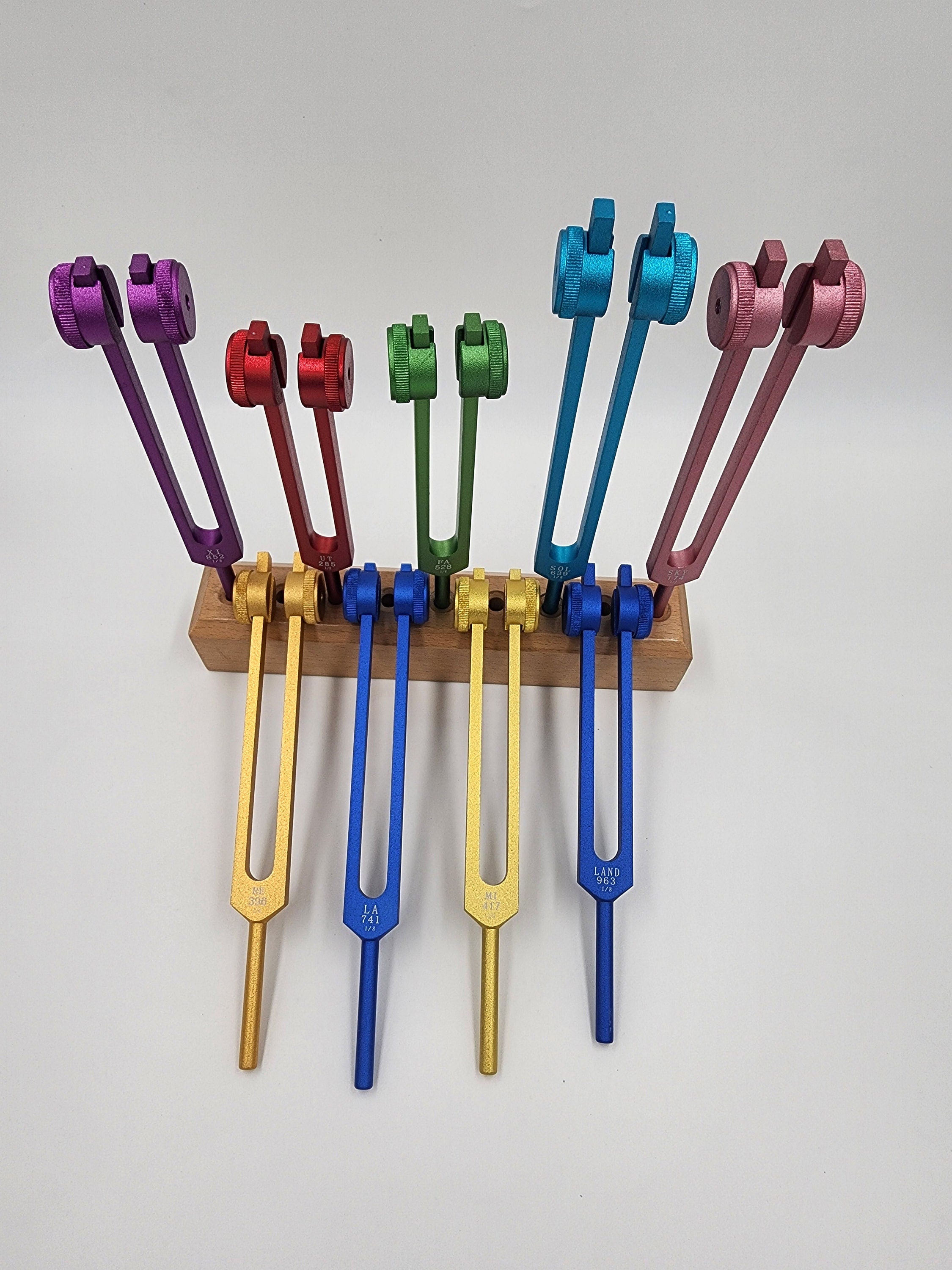 Weighted 9 Set Solfeggio Frequencies Tuning Forks For Healing Tuned .25 Hz for Sound Healing with WOODEN STAND BASE Strikers and Bags - Thecosmicaccess