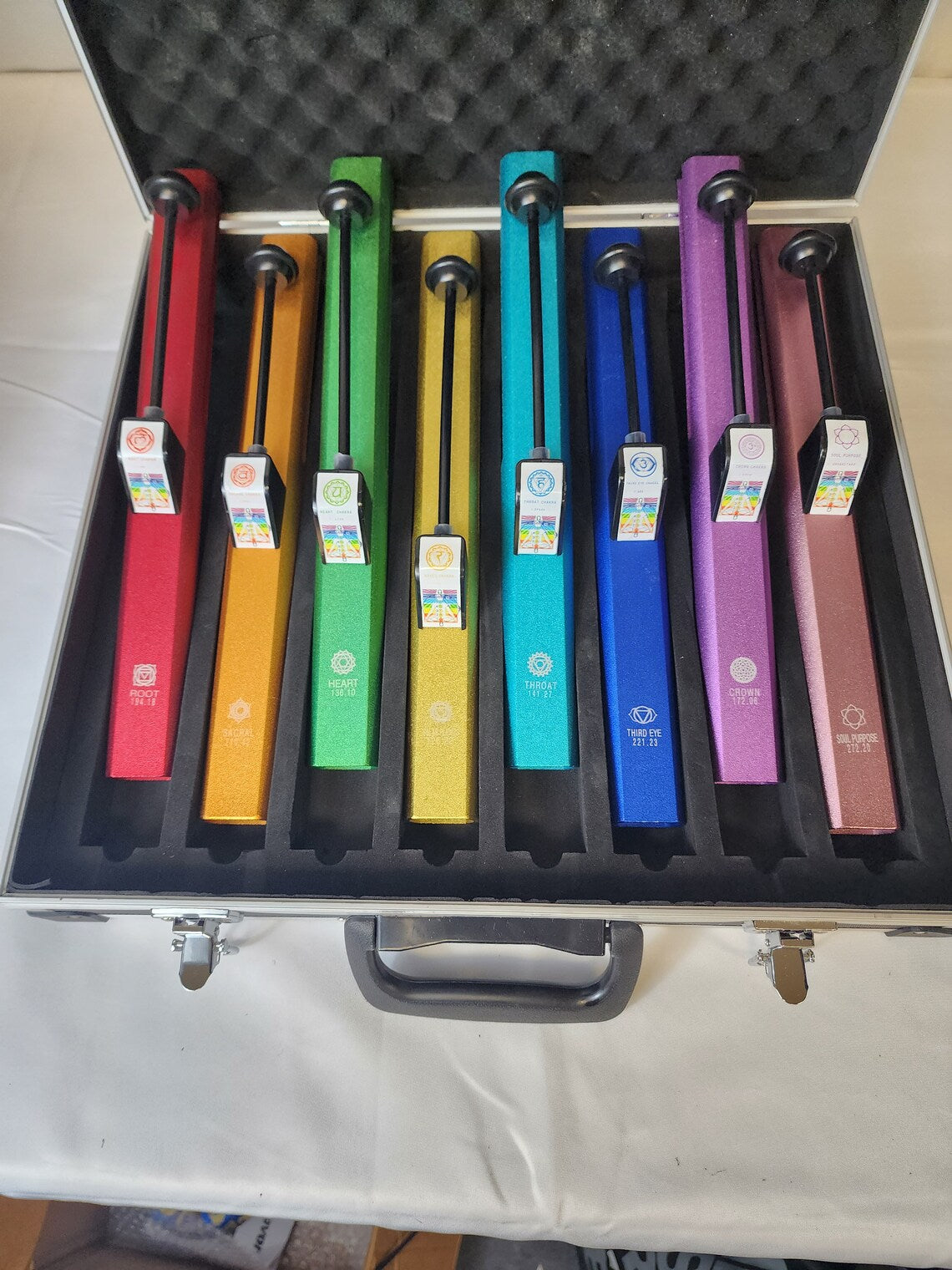 Harmonize Your Energy: The Complete Set of 8 Chakra Self Knock Pipes with Encased Die Cast Metal Container