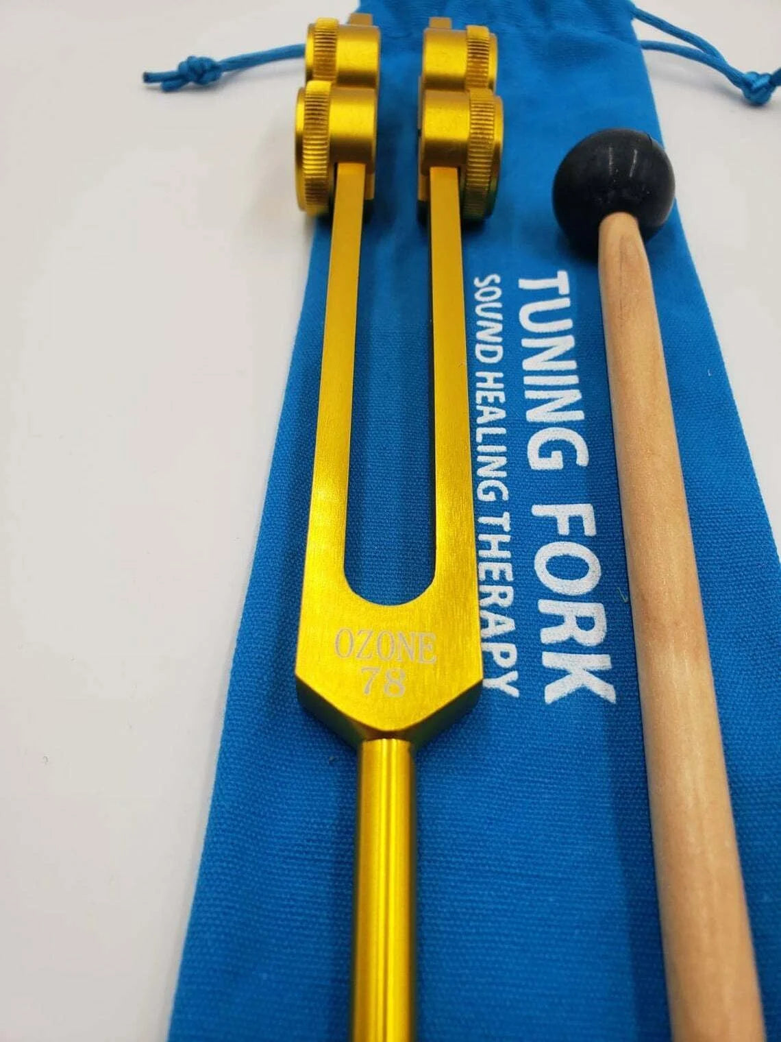 Ozone O3 78 Hz Weighted Gold Tuning Fork with Activator and Pouch - Thecosmicaccess
