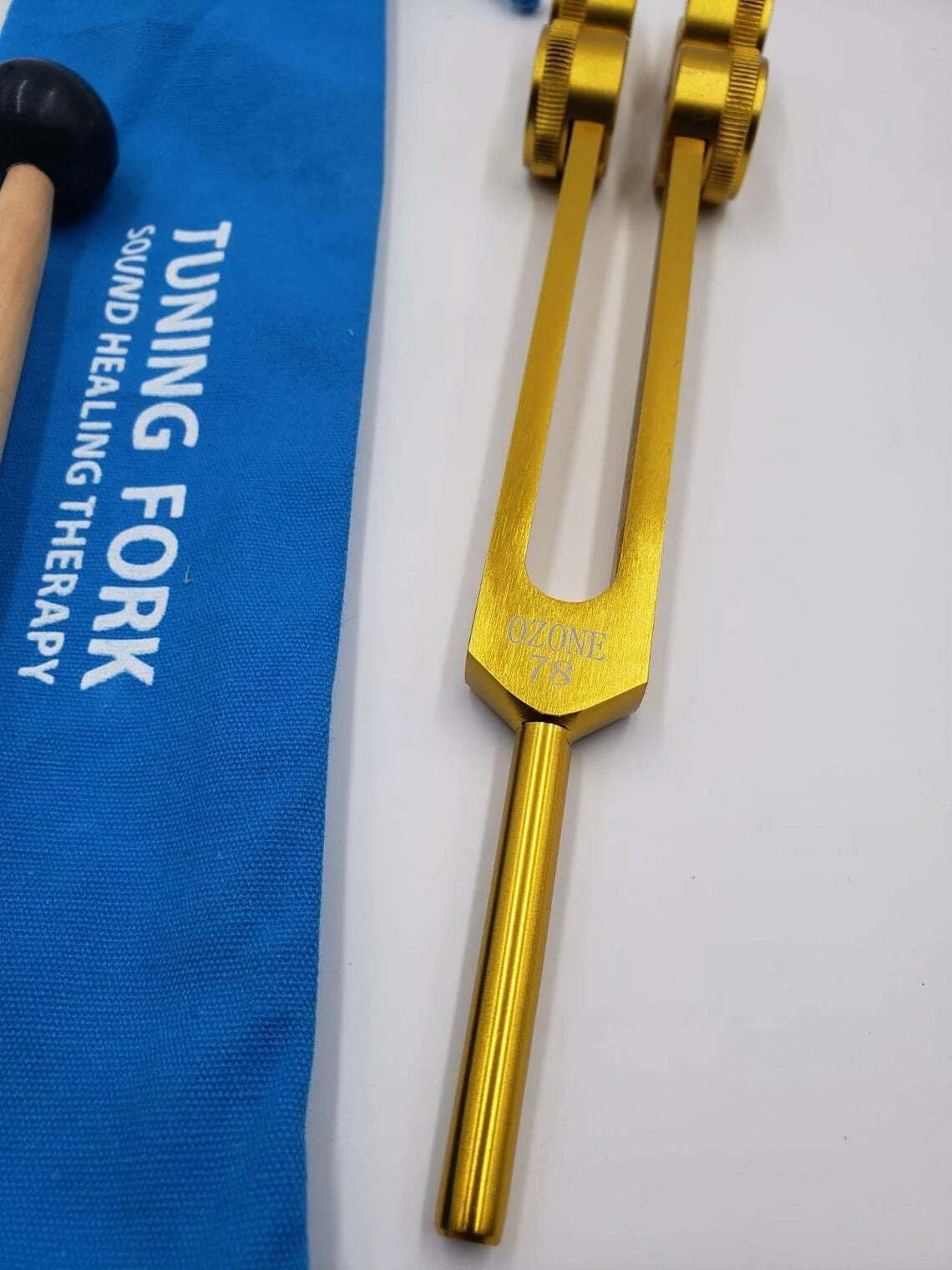 Ozone O3 78 Hz Weighted Gold Tuning Fork with Activator and Pouch - Thecosmicaccess