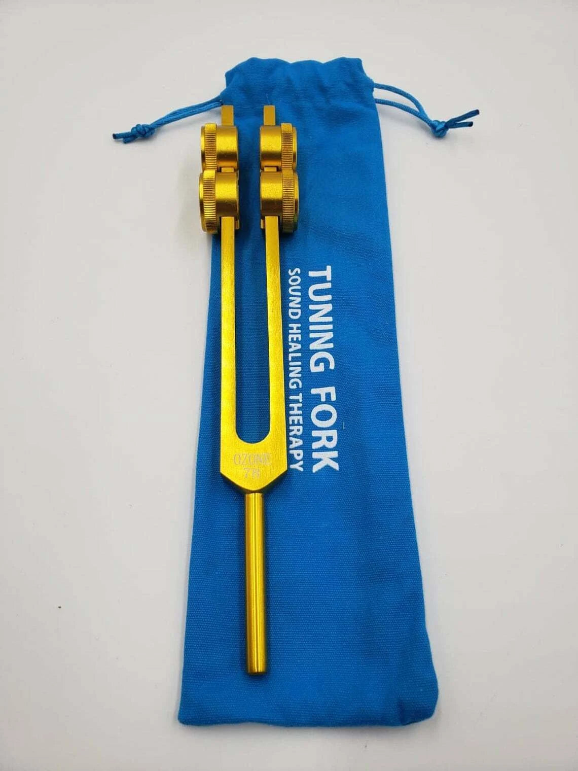Ozone O3 78 Hz Weighted Gold Tuning Fork with Activator and Pouch - Thecosmicaccess