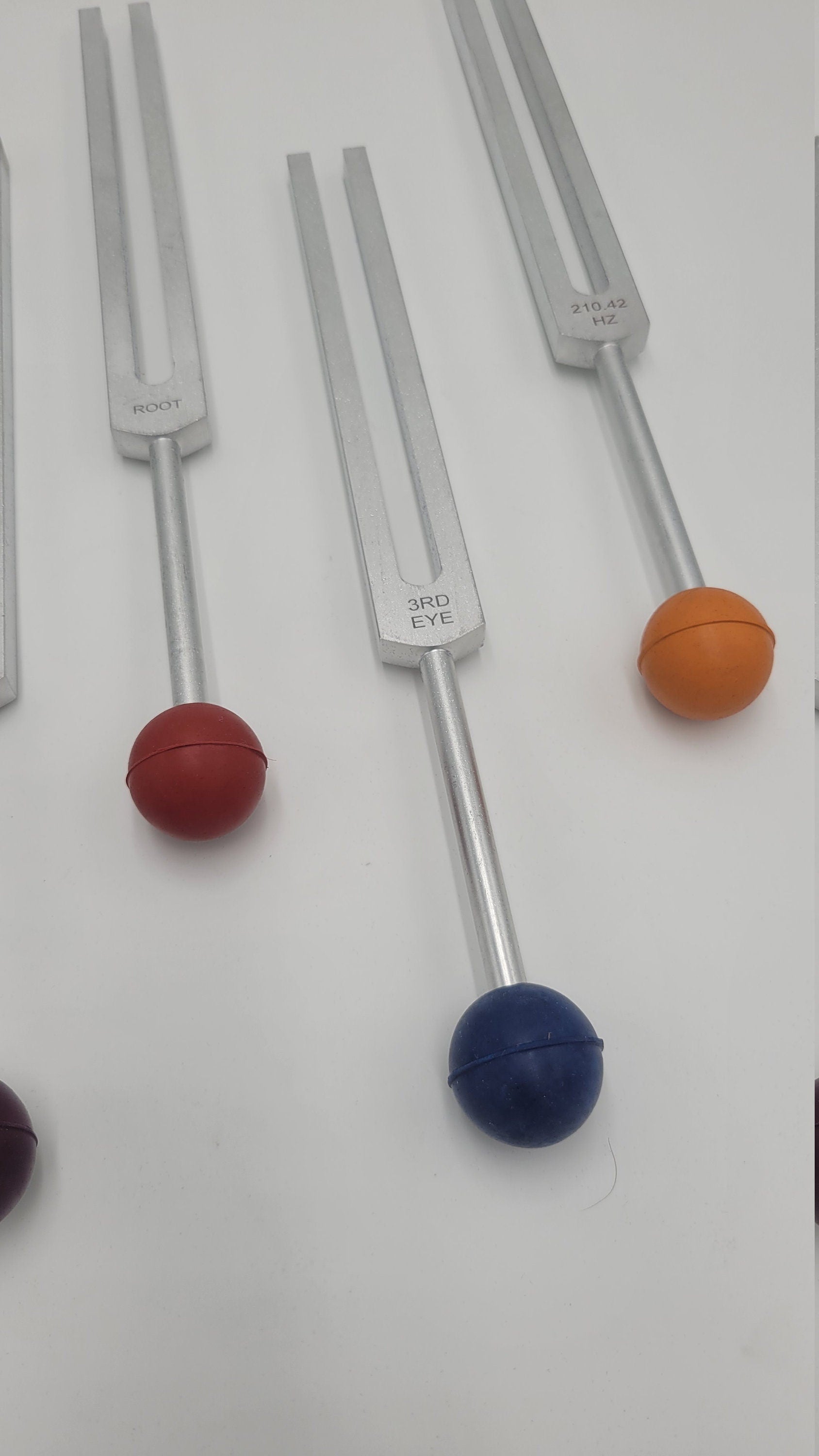 Chakra Tuning Forks Set of 7 with Long Handles Color Coded Removable Rubber Chakra Balls Pouch and 4 Mallets - Thecosmicaccess