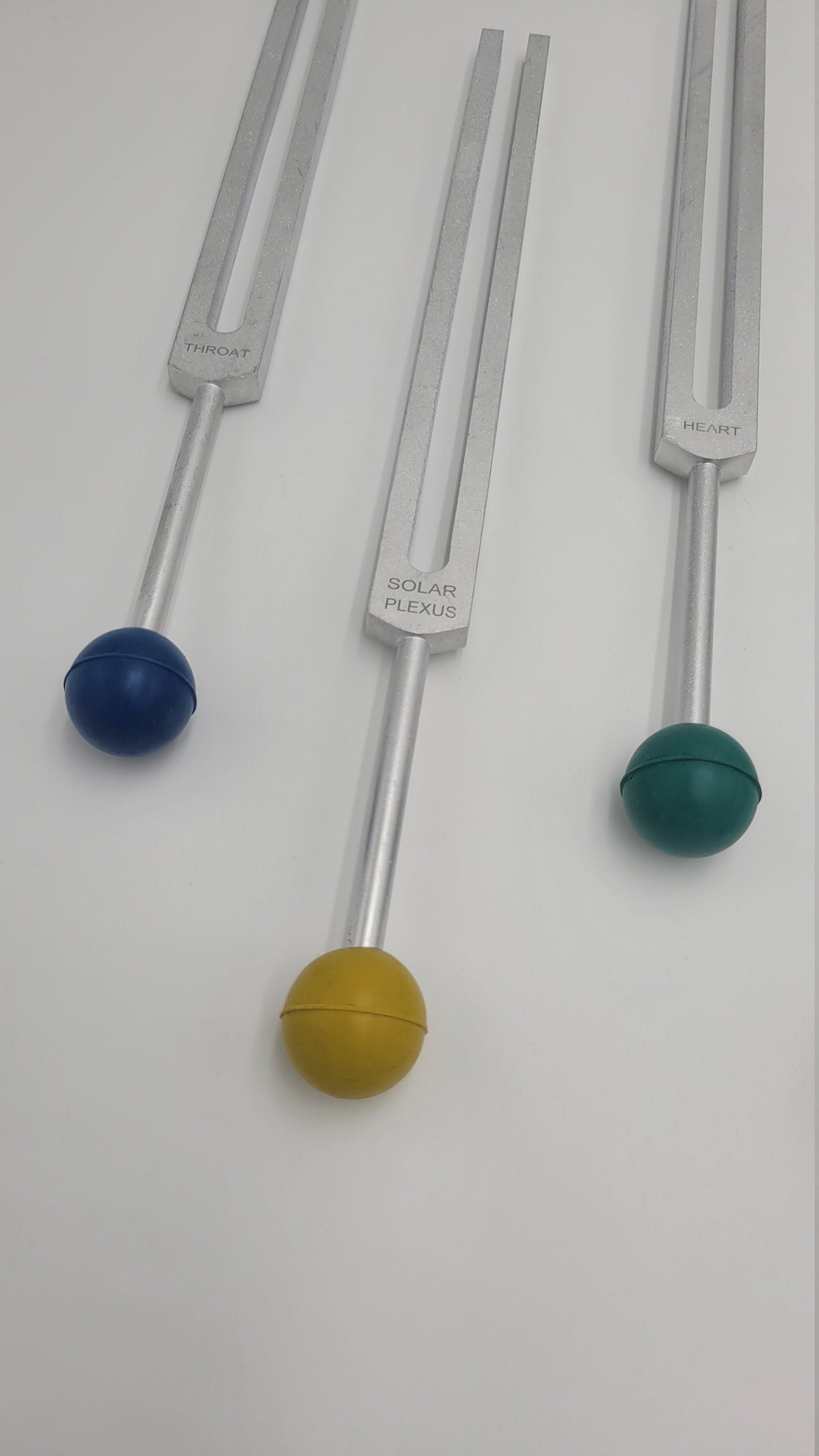 Chakra Tuning Forks Set of 7 with Long Handles Color Coded Removable Rubber Chakra Balls Pouch and 4 Mallets - Thecosmicaccess