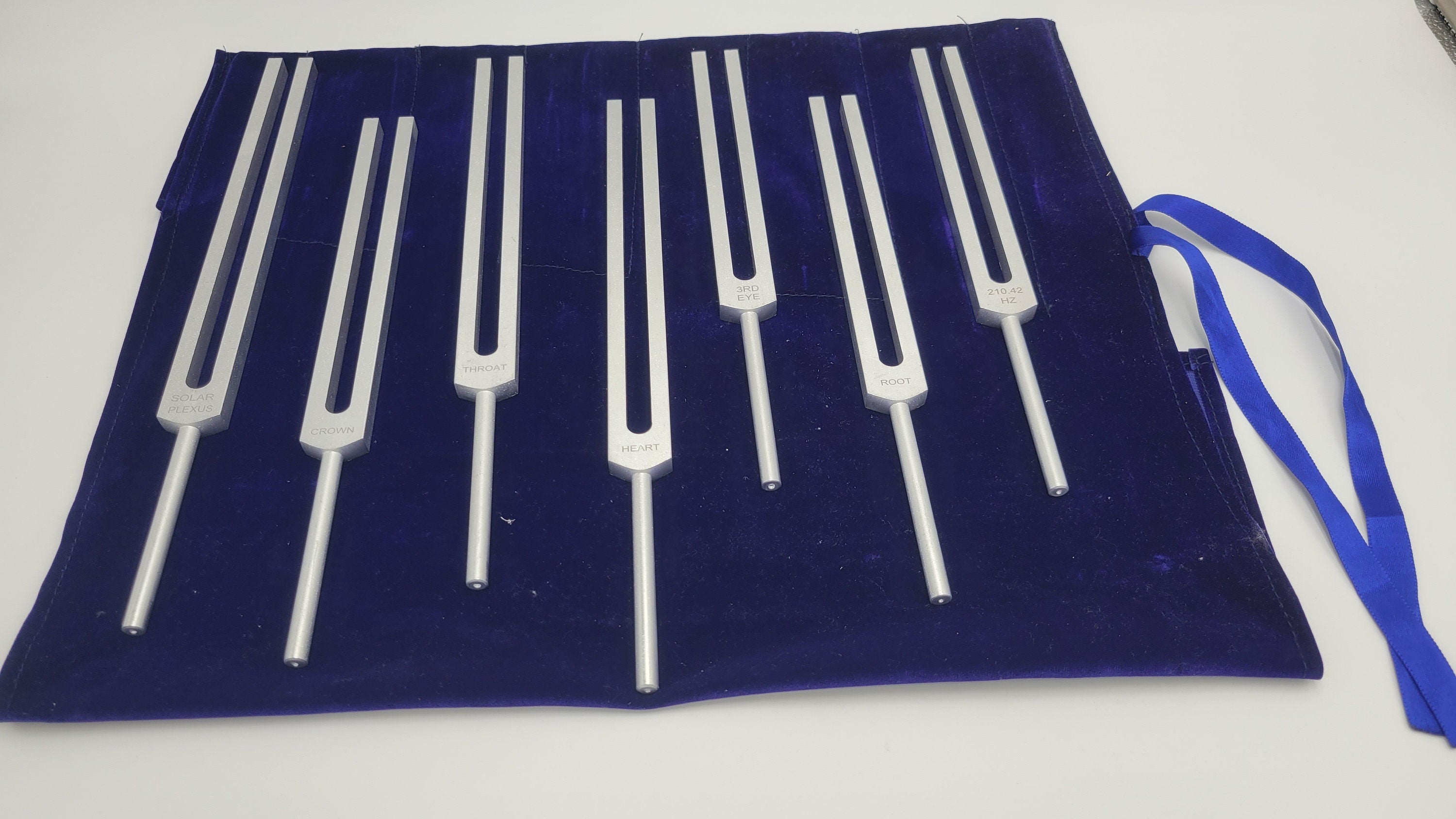 Chakra Tuning Forks Set of 7 Tuning Forks with Long Handles A Pouch and a Striker - Thecosmicaccess