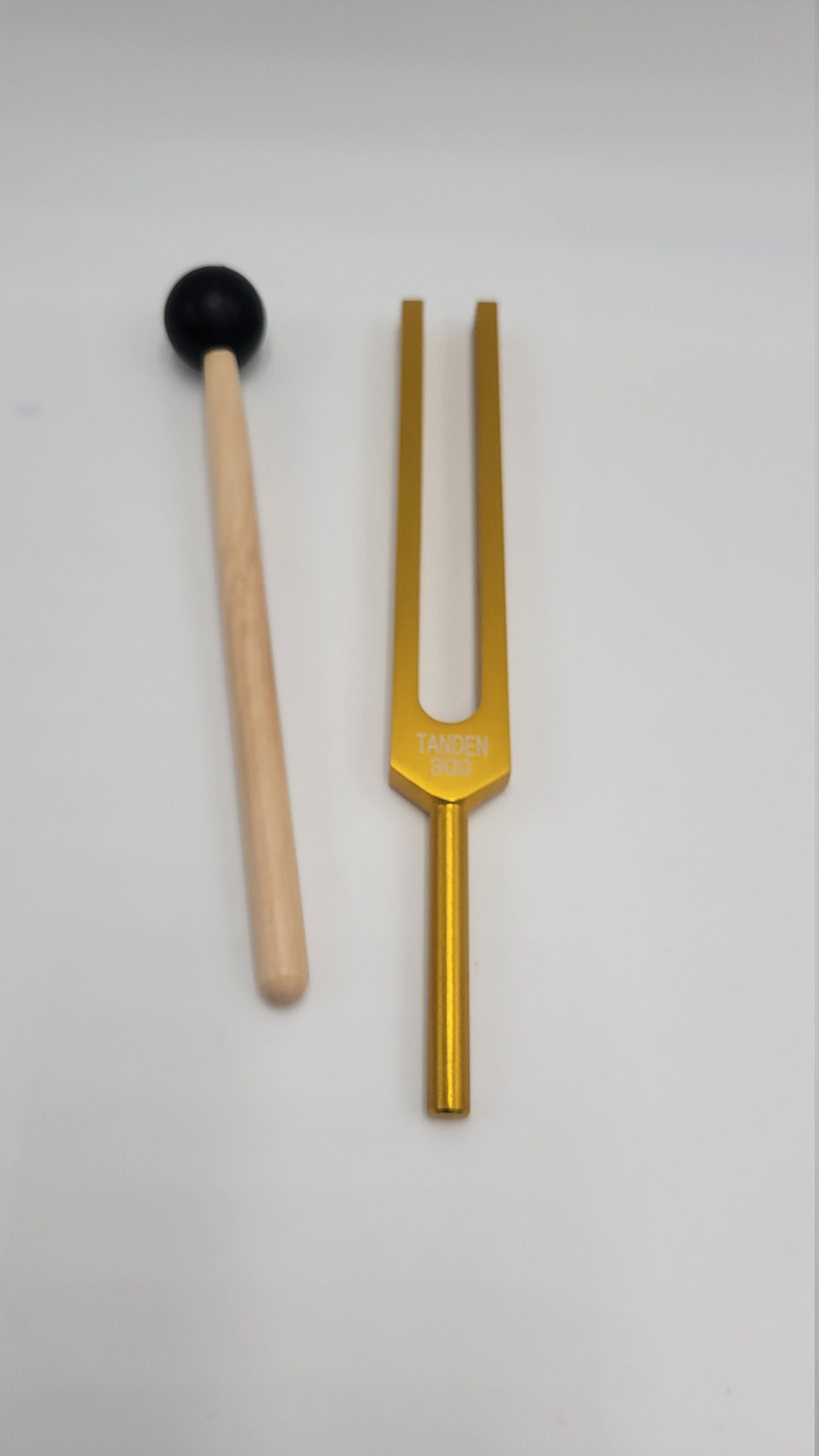 Gold Color Dan Tien Tanden 300Hz Unweighted Tuning Fork with Velvet Drawstring Pouch and Mallet - Thecosmicaccess