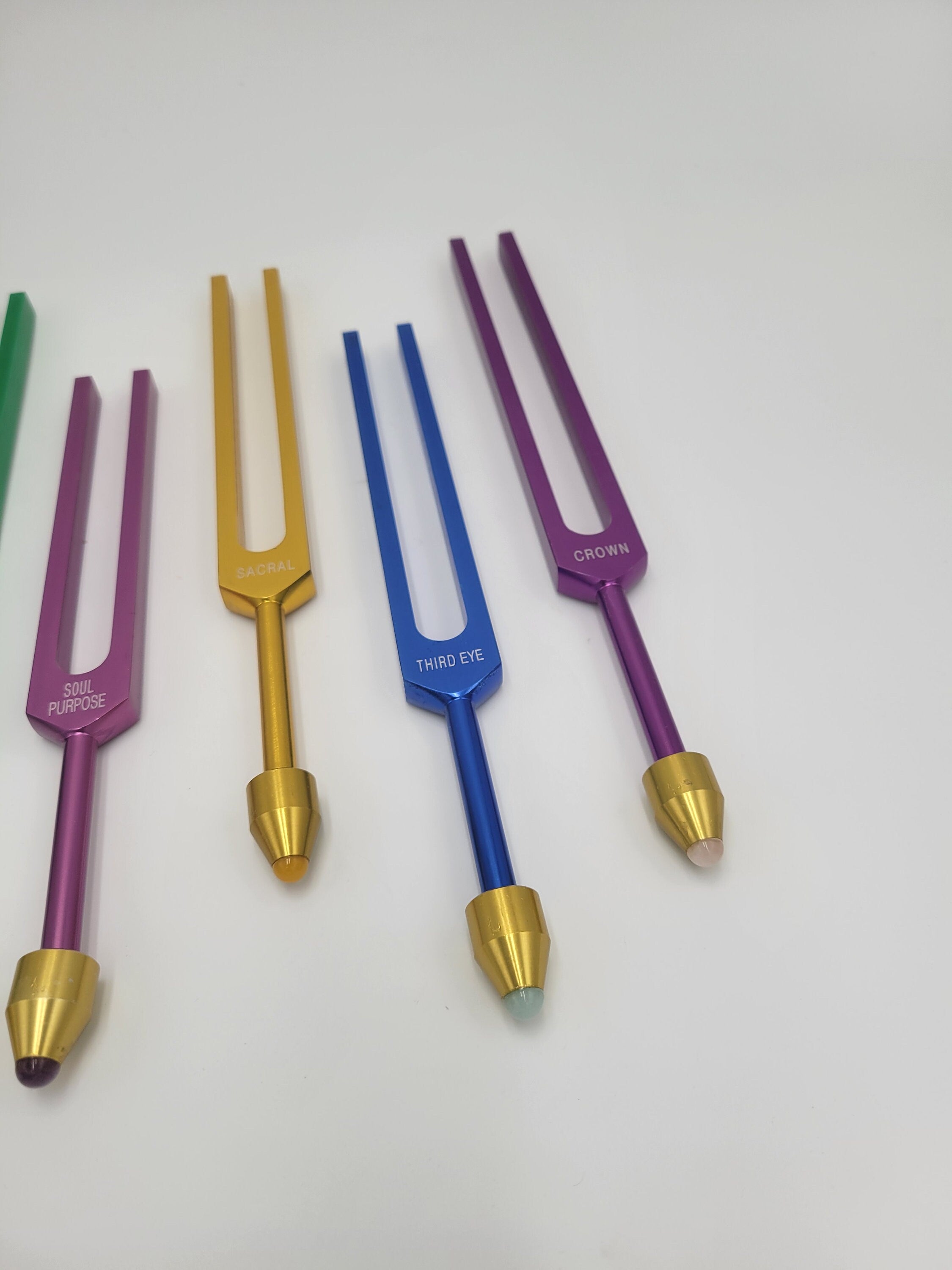 The Holistic Chakra Color Unweighted Tuning Fork Set with 8 GEM FEET on each Fork with 8 Mallets and Chakra Marked Drawstring Pouches - Thecosmicaccess