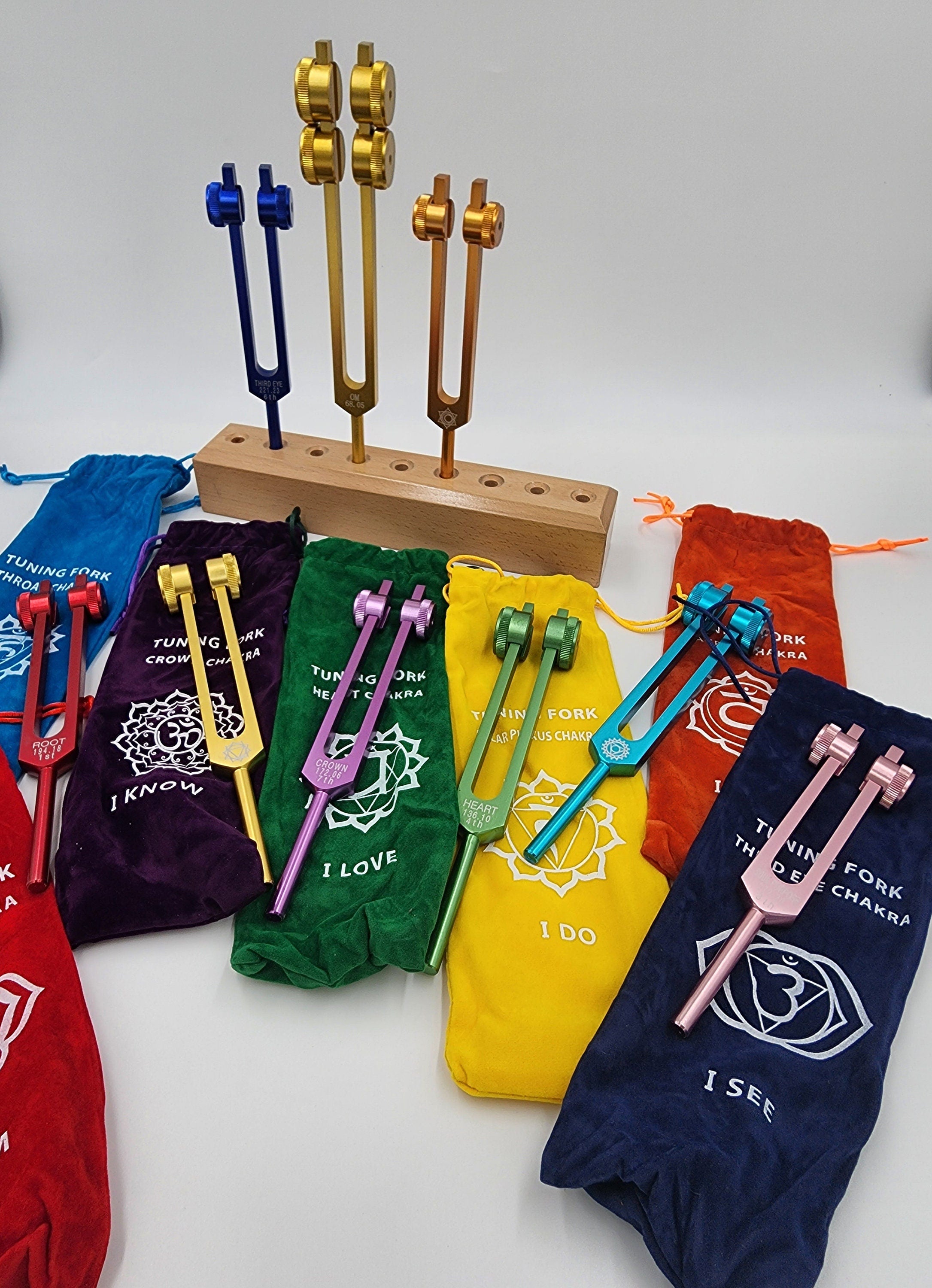 Color Weighted Chakra Tuning Fork Set of 9/8 with Heavy Duty Wooden Display Stand 8 Strikers and Individual Color Coded Sign Bags - Thecosmicaccess