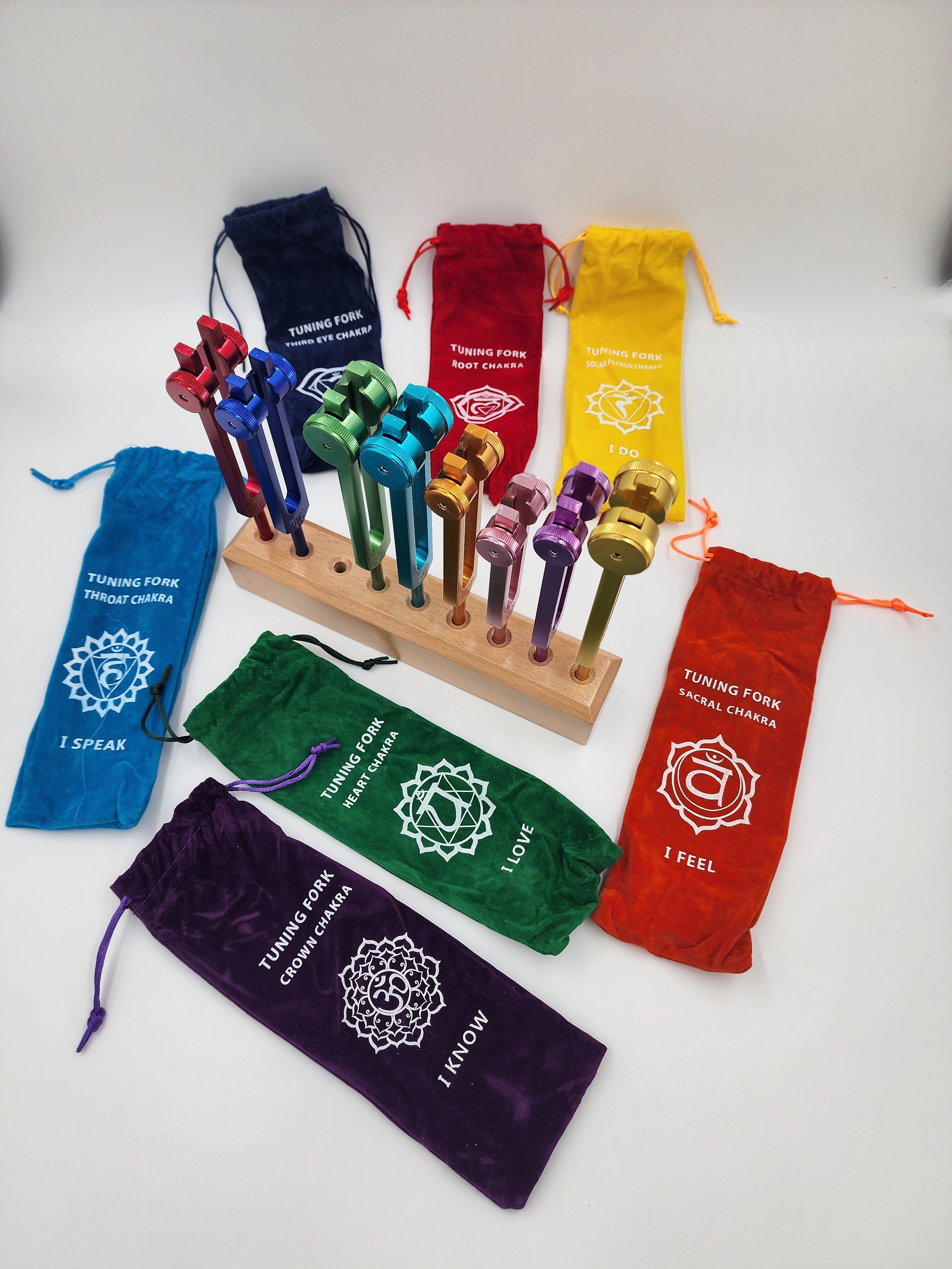 Color Weighted Chakra Tuning Fork Set of 9/8 with Heavy Duty Wooden Display Stand 8 Strikers and Individual Color Coded Sign Bags - Thecosmicaccess