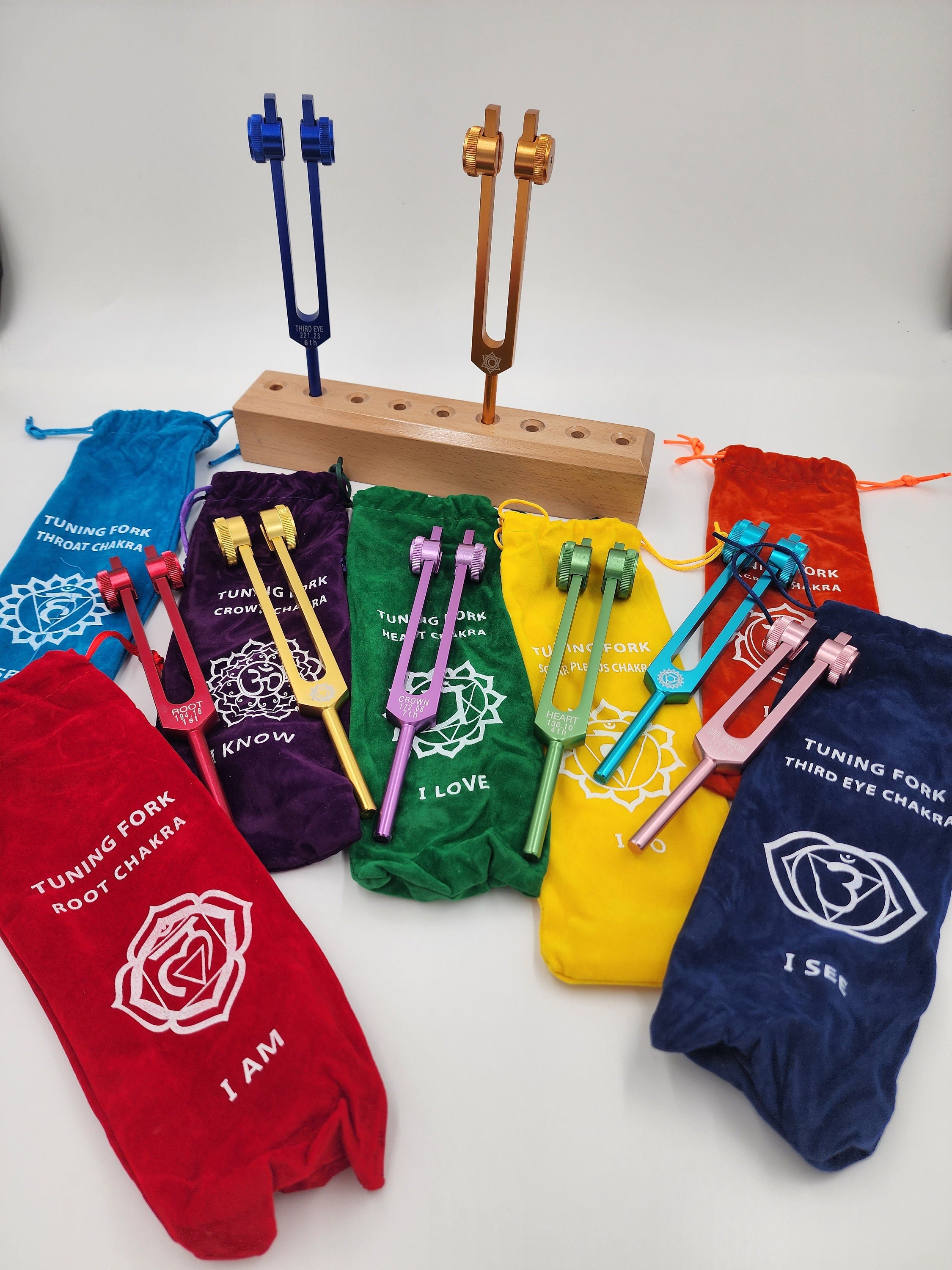 Color Weighted Chakra Tuning Fork Set of 9/8 with Heavy Duty Wooden Display Stand 8 Strikers and Individual Color Coded Sign Bags - Thecosmicaccess